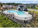 Community pool with a bath house and surrounding neighborhood homes at 4122 Vista Pine Dr, Charlotte, NC 28215