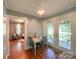 Bright dining area with French doors leading to the outdoors and hardwood floors at 436 8Th Avenue Nw Dr, Hickory, NC 28601
