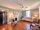 Inviting living room featuring hardwood floors, a fireplace, and ample natural light at 436 8Th Avenue Nw Dr, Hickory, NC 28601