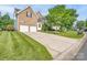 Beautiful brick home with an attached two car garage and a large lawn at 4392 Sunset Rose Dr, Fort Mill, SC 29708