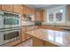 Kitchen featuring granite countertops, stainless steel appliances, and ample cabinet space for storage at 4392 Sunset Rose Dr, Fort Mill, SC 29708