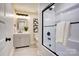 Modern bathroom featuring sleek fixtures, a glass-enclosed shower, and contemporary design at 445 Sundown Rd, Mooresville, NC 28117