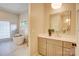 A bright bathroom featuring a soaking tub, double vanity, and lots of natural light at 445 Sundown Rd, Mooresville, NC 28117