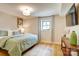 Bright bedroom with a comfortable queen bed, soft bedding, and lots of natural light at 445 Sundown Rd, Mooresville, NC 28117