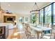 Bright dining room with hardwood floors, chandelier and view of living area at 445 Sundown Rd, Mooresville, NC 28117