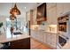 Kitchen featuring stainless appliances, pendant lighting, and a modern design at 445 Sundown Rd, Mooresville, NC 28117