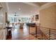 Spacious open-concept living space with hardwood floors connecting to a modern kitchen at 445 Sundown Rd, Mooresville, NC 28117