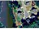 Aerial view of a neighborhood showing the house's location near the water at 5005 Blue Serenity Ct, Denver, NC 28037