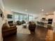 Spacious living room that seamlessly connects to the kitchen, offering an open-concept living space at 5005 Blue Serenity Ct, Denver, NC 28037