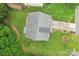 Aerial view of the house, revealing its roof, driveway, and surrounding landscaping at 5021 Meadow Woods Dr, Lowell, NC 28098