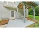 The backyard features a small patio area, perfect for outdoor seating and relaxation at 5021 Meadow Woods Dr, Lowell, NC 28098
