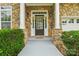 Inviting front porch with stone accents, perfect for welcoming guests to this beautiful home at 5021 Meadow Woods Dr, Lowell, NC 28098