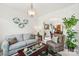 Inviting living room with elegant decor, comfortable seating, and an open layout, perfect for entertaining at 5021 Meadow Woods Dr, Lowell, NC 28098