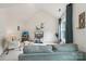 Comfortable living room with a vaulted ceiling, a sofa, television and a workspace at 5021 Meadow Woods Dr, Lowell, NC 28098