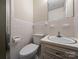 Bathroom with a white tiled shower and updated single sink vanity, providing a clean, functional space at 5628 White Store Rd, Wingate, NC 28174