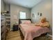Cozy bedroom with a comfortable bed, plush pillows, and natural light, creating a warm ambiance at 54 Woodsdale Se Pl, Concord, NC 28025