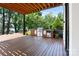 View of backyard patio with a built in stainless steel grill, perfect for outdoor entertaining at 5930 Midsomer Rd, Charlotte, NC 28214