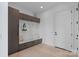 A spacious mudroom with custom cabinetry, a bench, and storage at 5930 Midsomer Rd, Charlotte, NC 28214