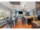 Open floor plan featuring the kitchen, dining area, and living room with a fireplace at 6057 Erie View Ct, Denver, NC 28037