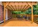 This partially covered back deck offers a peaceful place to relax and enjoy the natural view from the comfort of your home at 6294 Southlake Dr, Hickory, NC 28601