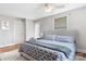Comfortable bedroom with a stylish upholstered headboard and neutral color scheme at 6294 Southlake Dr, Hickory, NC 28601
