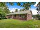 Well-maintained brick home with a metal roof, offering a blend of classic charm and durability at 6294 Southlake Dr, Hickory, NC 28601