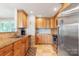 Modern kitchen with stainless steel appliances, tile flooring, granite counters, and ample natural light at 6294 Southlake Dr, Hickory, NC 28601
