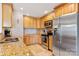 Bright kitchen featuring stainless steel appliances, granite countertops, and tile backsplash, perfect for culinary enthusiasts at 6294 Southlake Dr, Hickory, NC 28601