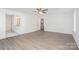 Spacious main bedroom with ensuite bathroom, ceiling fan, and ample natural light at 722 Lithia Inn Rd, Lincolnton, NC 28092