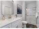 Well-lit bathroom featuring a single vanity, white countertops, and a glass-enclosed shower at 726 Lithia Inn Rd, Lincolnton, NC 28092