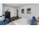 Comfortable bedroom with rich wood floors and contemporary decor, including blue accents at 726 Lithia Inn Rd, Lincolnton, NC 28092