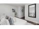 Bright bedroom featuring modern decor, including stylish bedding and a wall mirror at 726 Lithia Inn Rd, Lincolnton, NC 28092