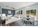 Bright living room features a modern design with plush seating, stylish decor, and ample natural light at 726 Lithia Inn Rd, Lincolnton, NC 28092
