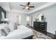 Spacious main bedroom features a ceiling fan and ensuite bathroom at 726 Lithia Inn Rd, Lincolnton, NC 28092