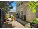 Private patio with a grill, outdoor seating, and garden, ideal for relaxing at 7671 Bluff Point Ln, Denver, NC 28037