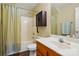 Bathroom featuring a shower and tub combo with updated vanity and fixtures at 7671 Bluff Point Ln, Denver, NC 28037