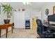 Functional office space with natural light, closet space and a comfortable desk setup at 7671 Bluff Point Ln, Denver, NC 28037