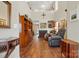 Spacious living room with hardwood floors, fireplace, and high ceilings at 7671 Bluff Point Ln, Denver, NC 28037