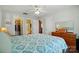 Bright main bedroom with an ensuite bathroom and a walk-in closet, providing comfort and convenience at 7671 Bluff Point Ln, Denver, NC 28037
