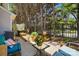 Inviting patio with stylish furniture, lush greenery, and decorative accents at 7671 Bluff Point Ln, Denver, NC 28037