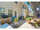 Patio with seating, a grill, and potted plants, perfect for outdoor entertaining at 7671 Bluff Point Ln, Denver, NC 28037