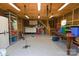 Spacious garage with storage, utility sink and stairs at 7869 Cherry Point Dr, Denver, NC 28037