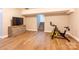 Spacious finished basement with hard flooring and ample room for fitness equipment at 8340 Brief Rd, Mint Hill, NC 28227