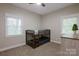 Bedroom with bunk beds, carpet, and natural light at 8340 Brief Rd, Mint Hill, NC 28227