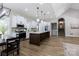 Spacious kitchen featuring a large island, stainless steel appliances, and ample cabinet space at 8340 Brief Rd, Mint Hill, NC 28227