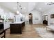 Bright kitchen featuring a large island, stainless steel appliances, and ample cabinet space at 8340 Brief Rd, Mint Hill, NC 28227