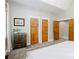 Light and bright main bedroom with walk in closet and wood doors at 8340 Brief Rd, Mint Hill, NC 28227