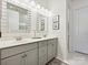 Bathroom featuring a double vanity with modern lighting at 9405 Gladden Hill Ln, Pineville, NC 28134