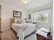 Cozy bedroom filled with natural light, plush bedding, and stylish decor for relaxation at 9405 Gladden Hill Ln, Pineville, NC 28134