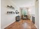 Inviting bonus room with hardwood floors, natural light, and stylish decor accents; great space! at 9405 Gladden Hill Ln, Pineville, NC 28134